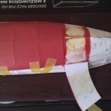 32257826962360707781